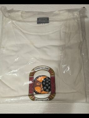 Muse White Crewneck Tee with Black Brand Tag